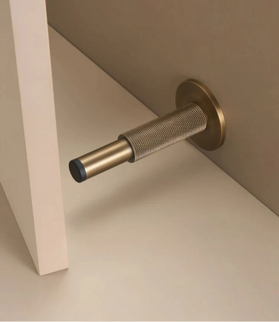 Univers des Poignées Butée de Porte Nervurée Laiton 100mm